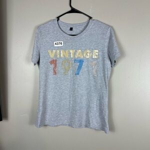 Tee shirt short sleeve 18-1/2 p2p 23 length. Worn a few times large